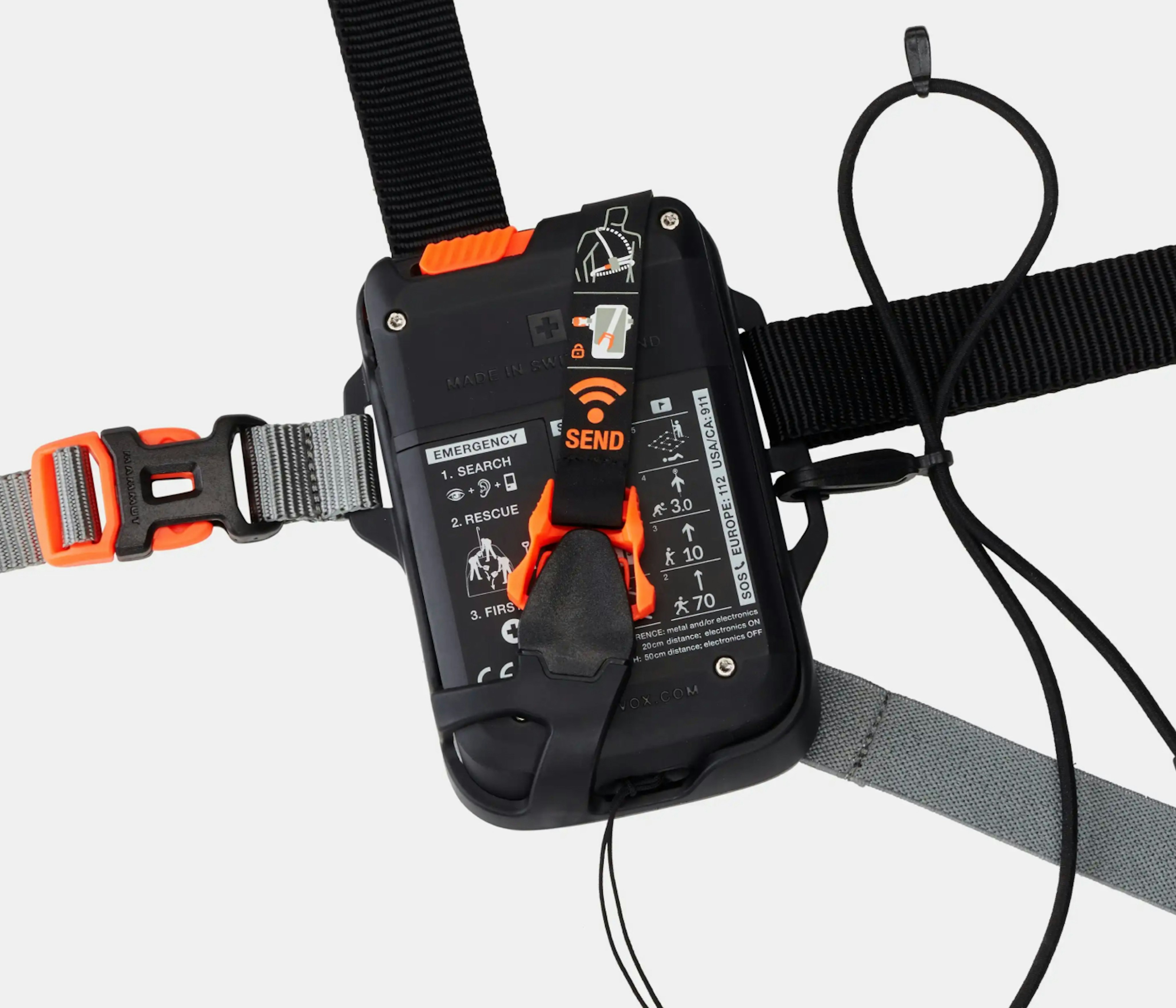 Mammut avalanche transceiver Barryvox S2 with adjustable straps, featuring a clear screen, intuitive controls, and detailed emergency instructions on the front for mountaineering safety.